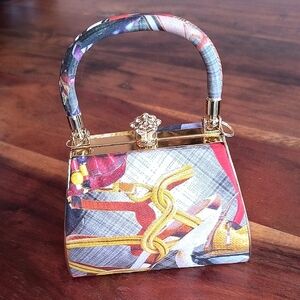 Classy Simon Chang Multicolor Handbag with Gold Accents. Great Condition.